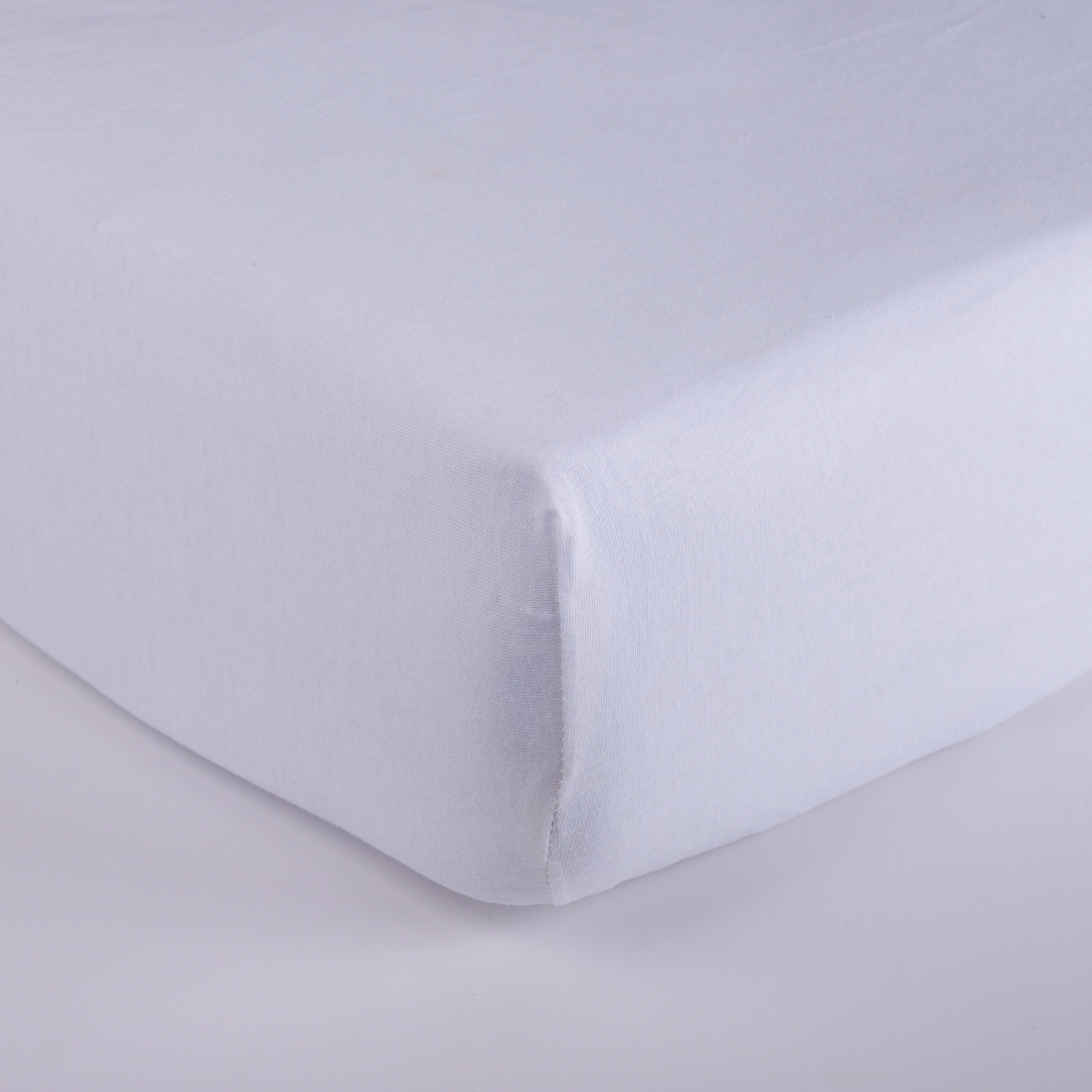 White Jersey fitted sheets underneath bianco Maè